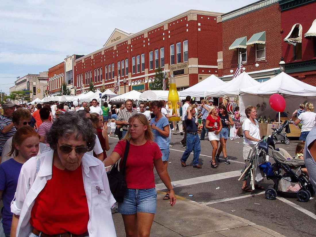 Downtown Valpo festival scene — illustrative community gathering stock for mixed-use place-making