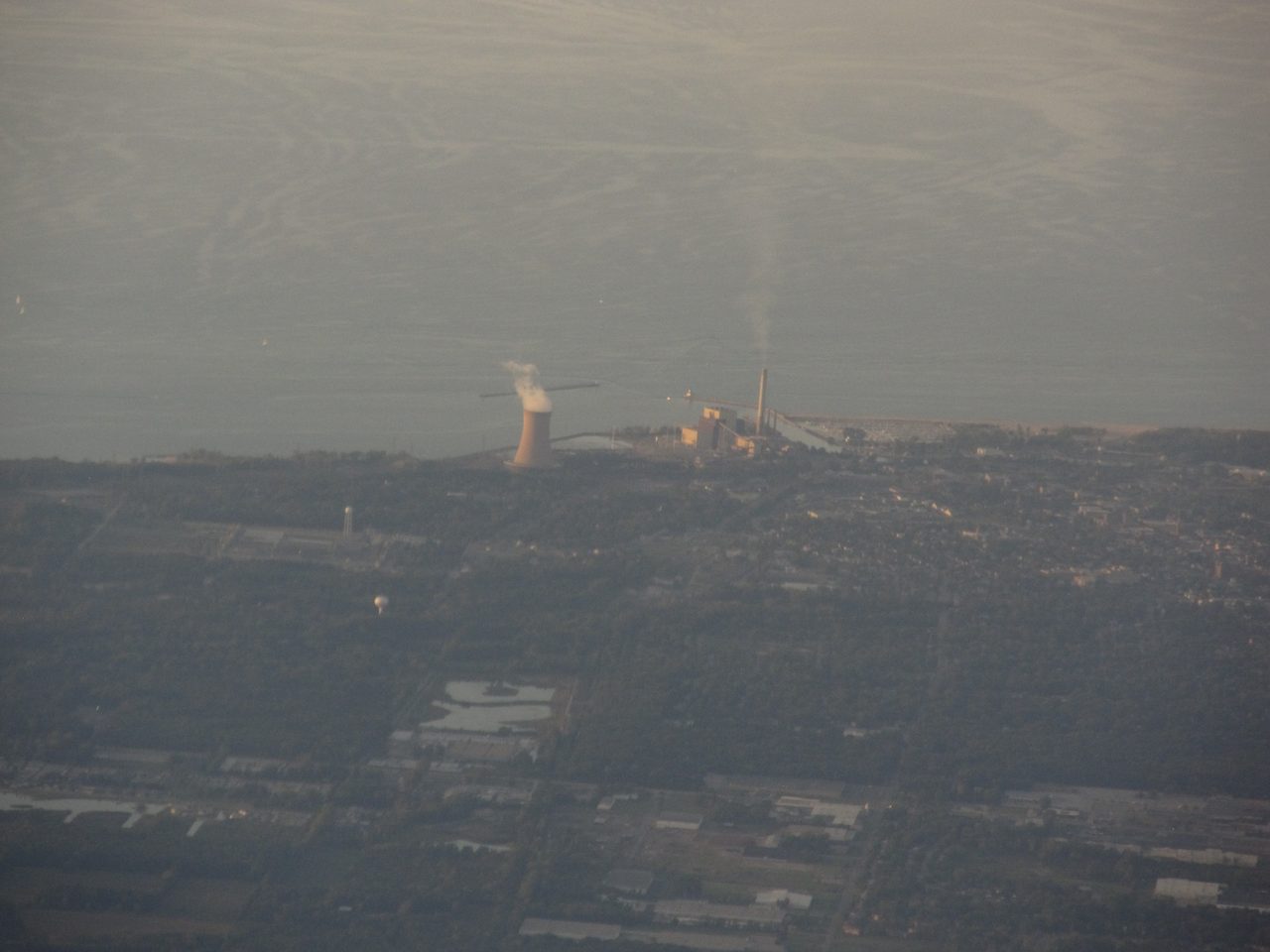 NIPSCO's Michigan City Generating Station on the Lake Michigan shore, seen from the air.