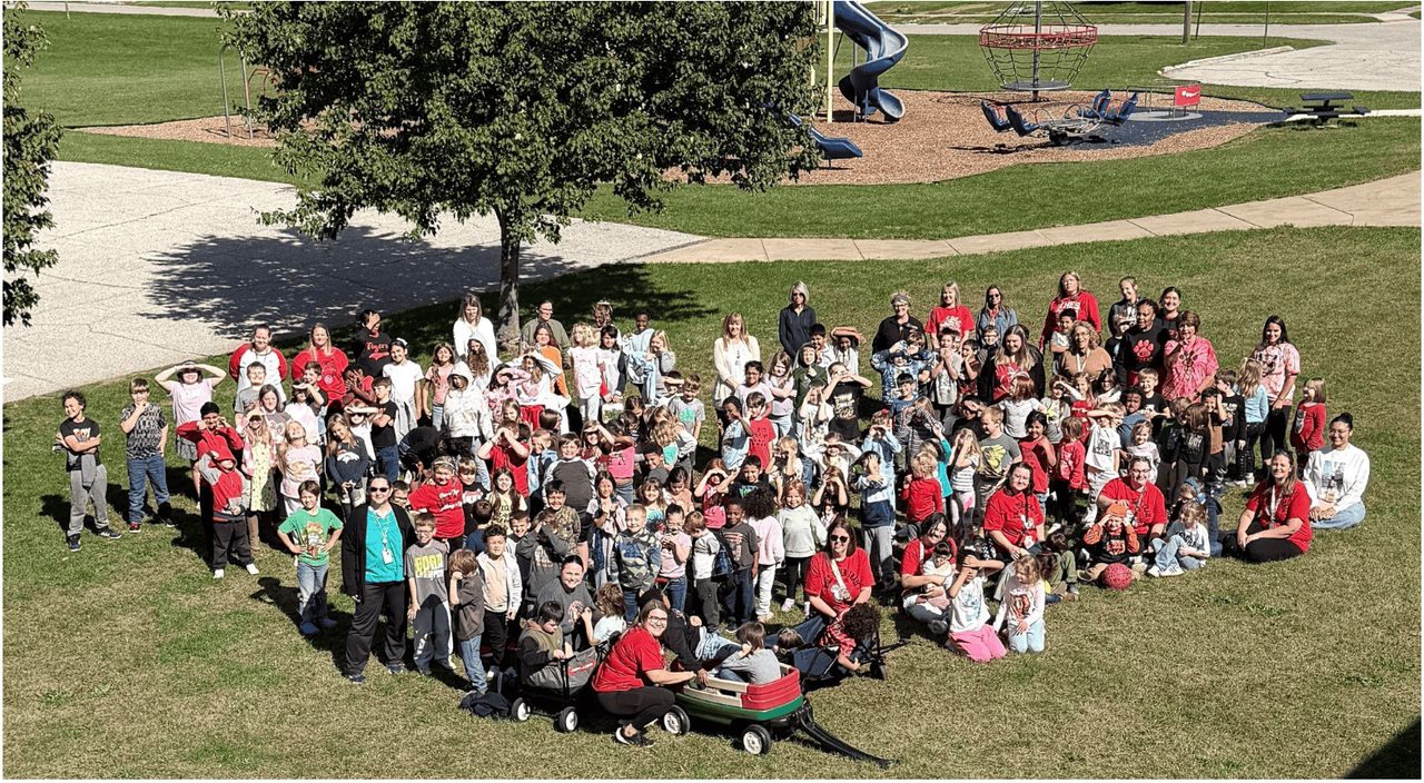 Kingsford Heights Elementary students and staff in a group photo that ran with the district's announcement