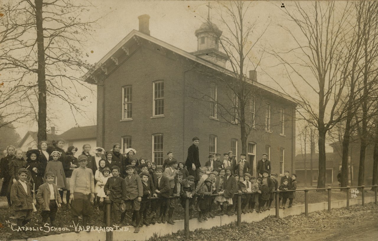 Students pose outside the Catholic school of St. Paul parish in Valparaiso in a postcard from about 1910