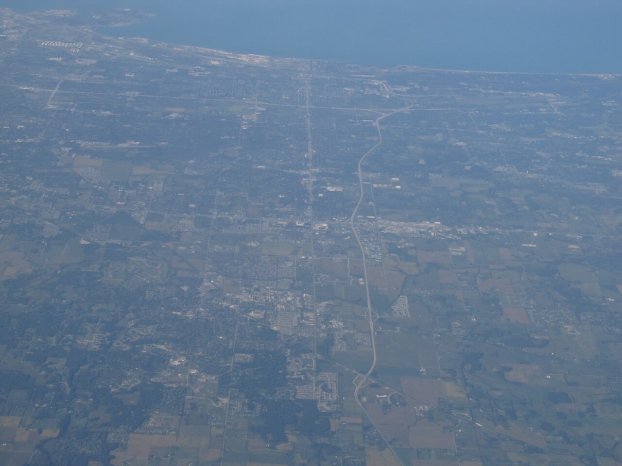 Aerial view over Crown Point, the Lake County seat, with Lake Michigan on the horizon.