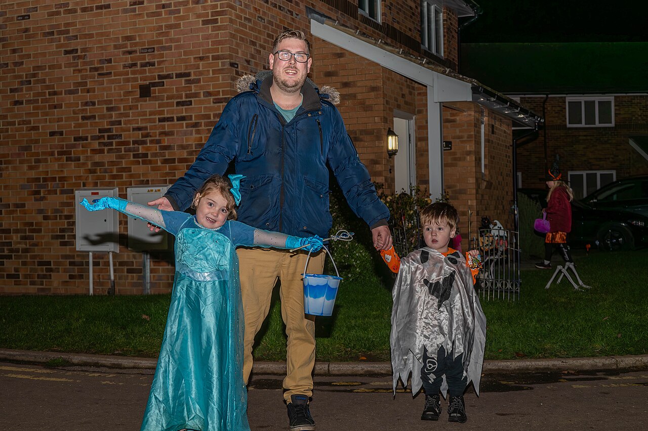 Trick-or-treaters in costume with an adult near RAF Croughton, England, on Halloween 2023. Illustrative; not Michigan City.